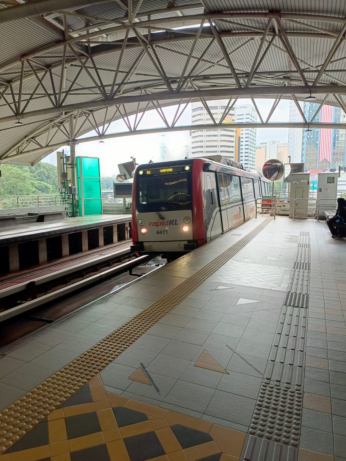 An LRT train at an elevated KL station